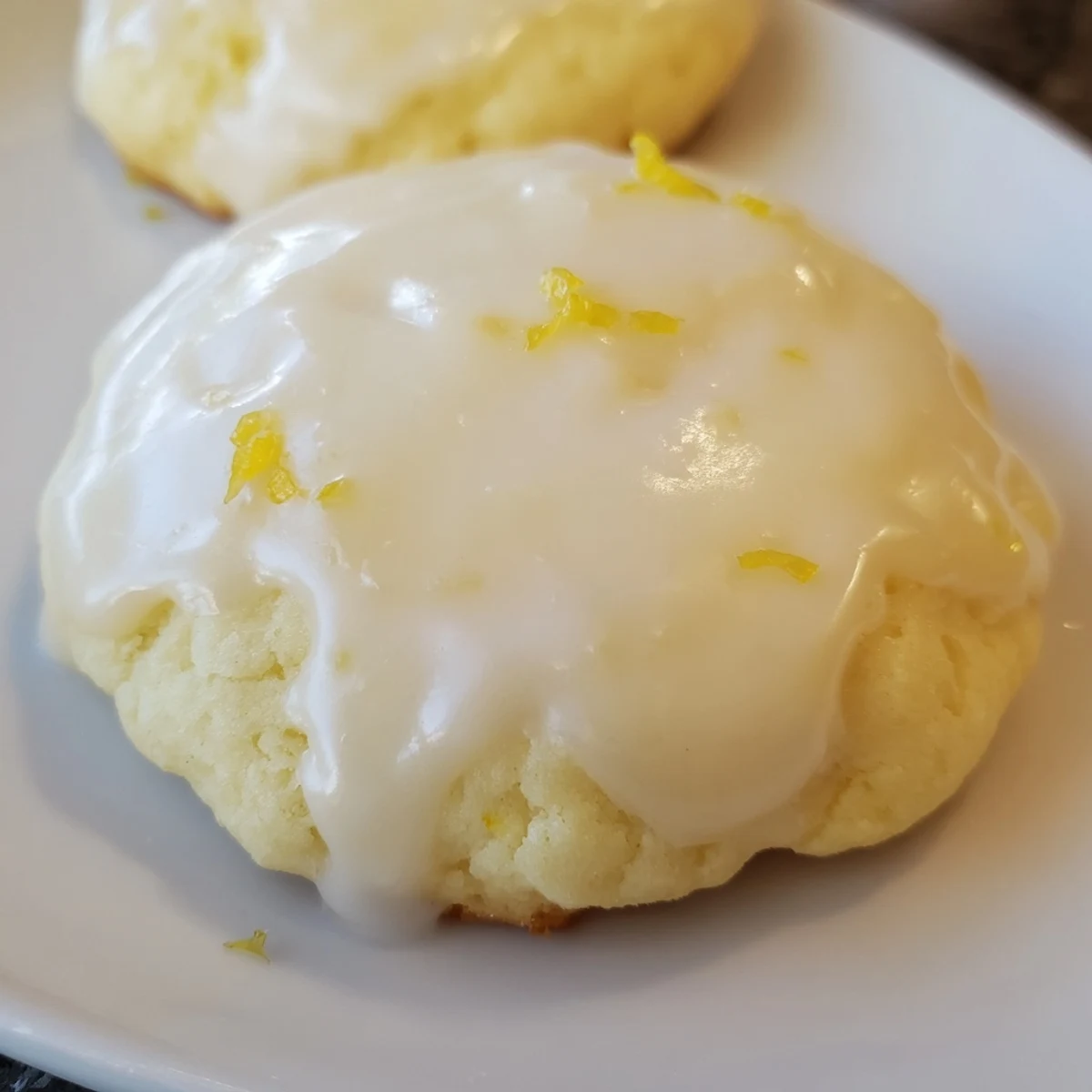 Lemon Ricotta Cookies with Glaze arranged on a wire rack, cooling after baking, ready to serve with coffee or tea.