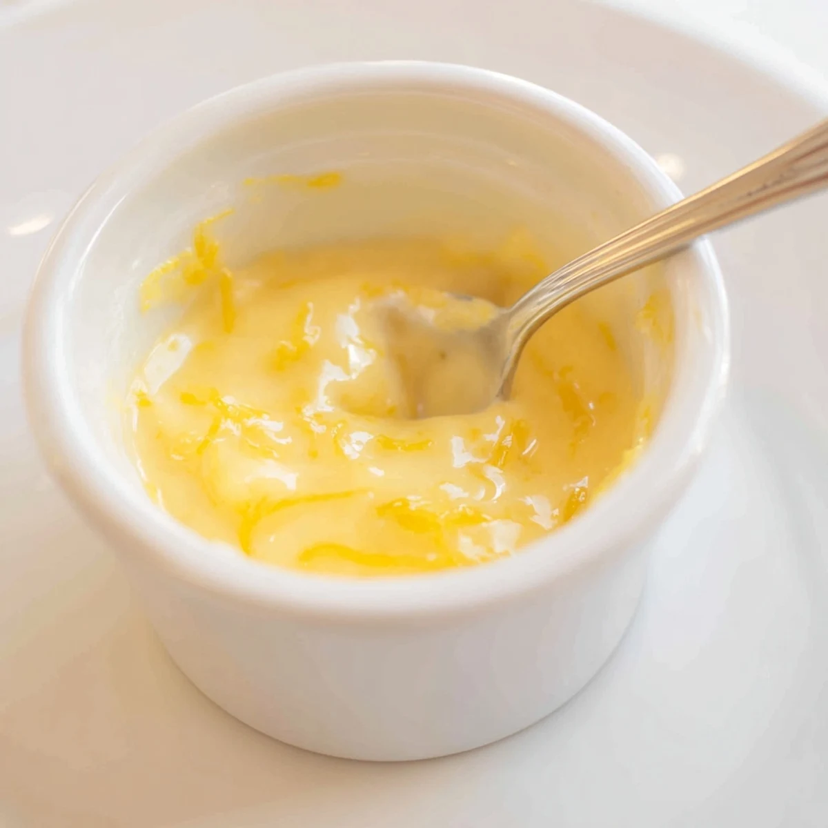 Homemade Lemon Curd Recipe cooling in double boiler, thick, intensely tangy